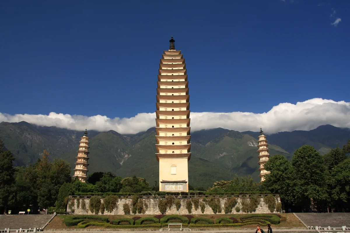 Three Pagodas of Chongsheng Temple against mountain backdrop