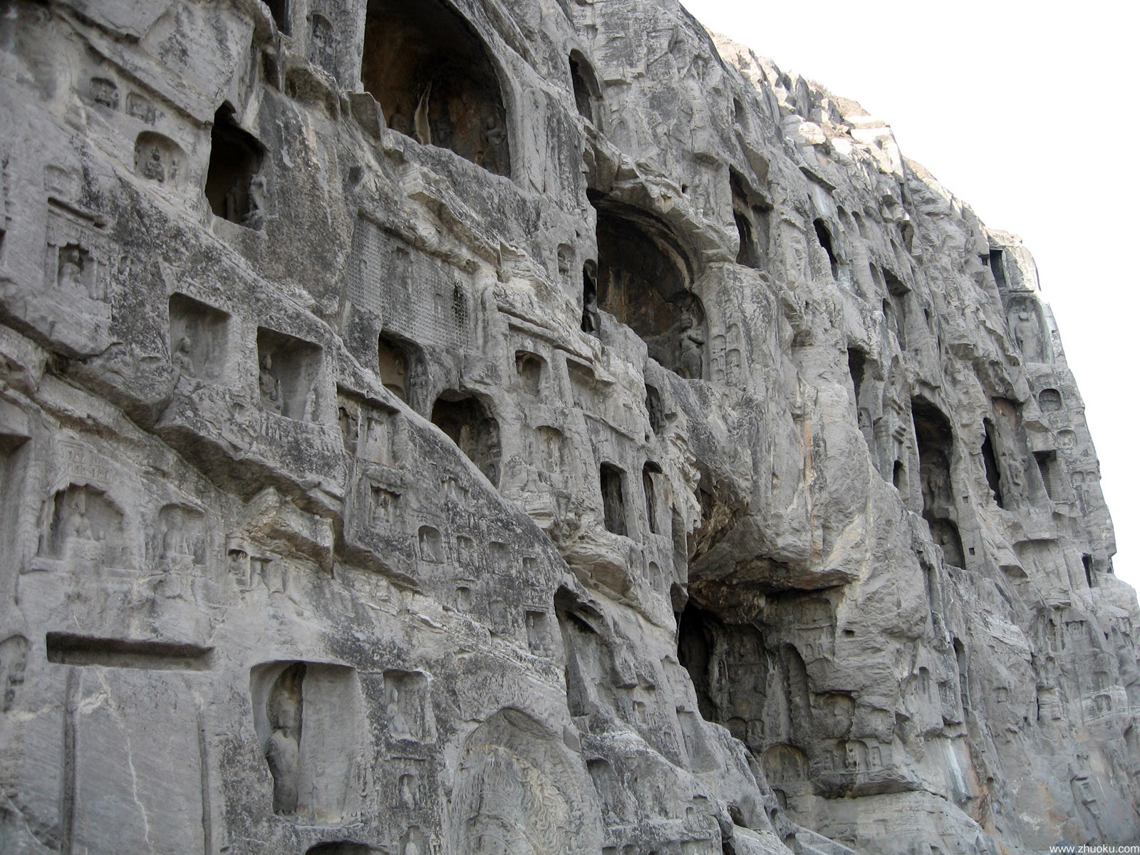 Ten Thousand Buddhas Cave interior with small Buddha figures