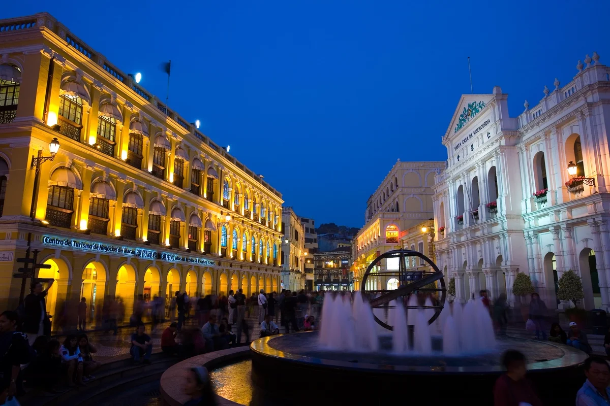 Senado Square with wave-patterned pavement and colonial buildings