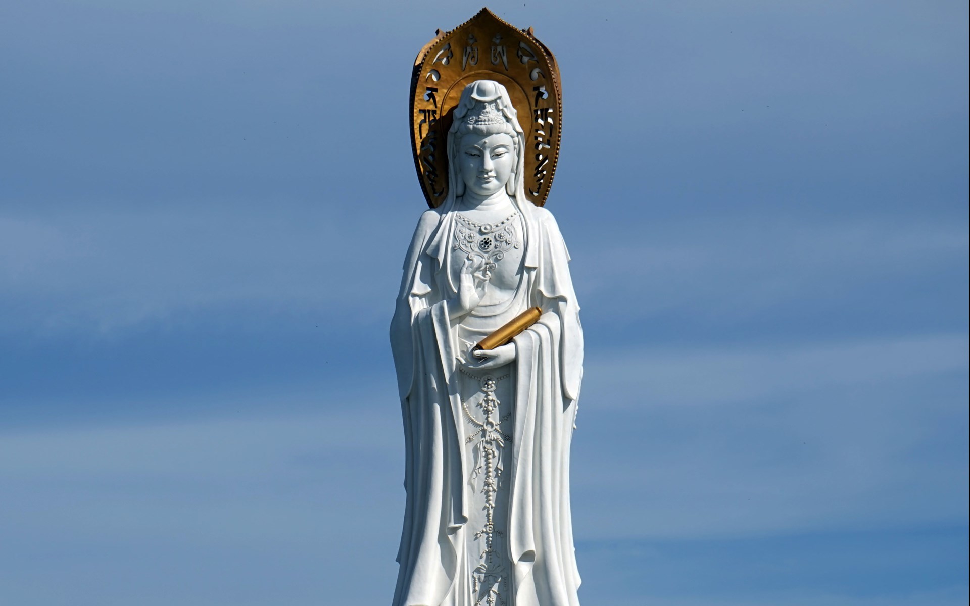 The towering Nanshan Guanyin statue rising from the sea