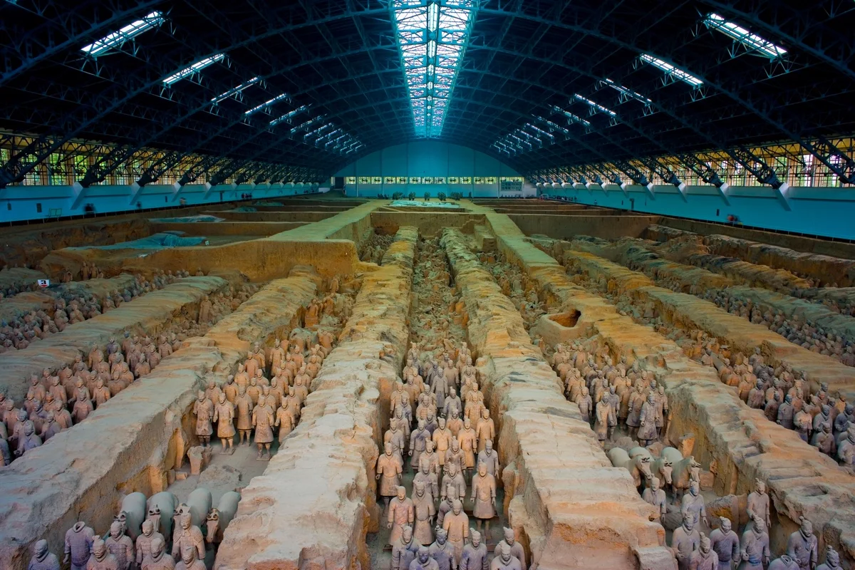 The unexcavated tomb mound of Qin Shi Huang rises above the Lintong landscape, concealing what ancient texts describe as a subterranean paradise