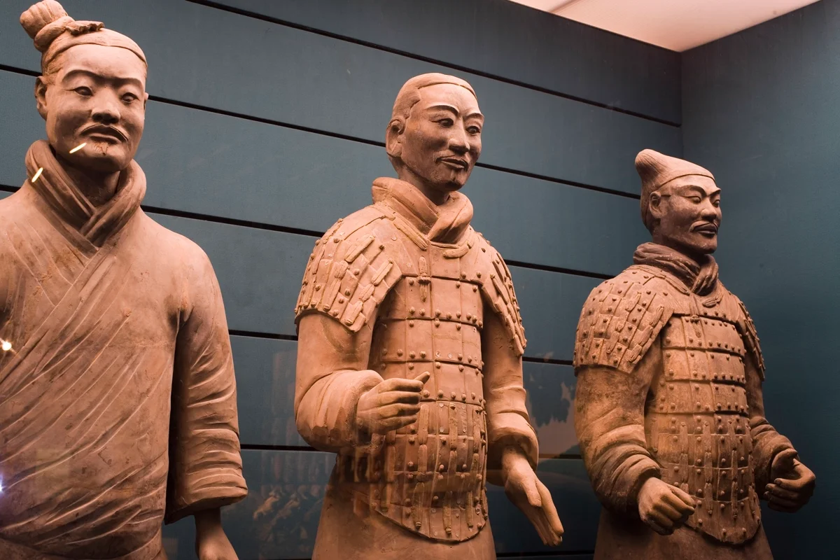 The main excavation pit reveals thousands of terracotta warriors standing in battle formation, stretching as far as the eye can see